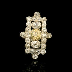 Antique yellow and white diamond ring