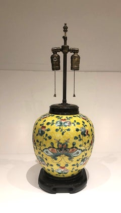 Antique Yellow Decorated Chinese Ginger Jar Lamp with Shaped Wood Base and Cap.