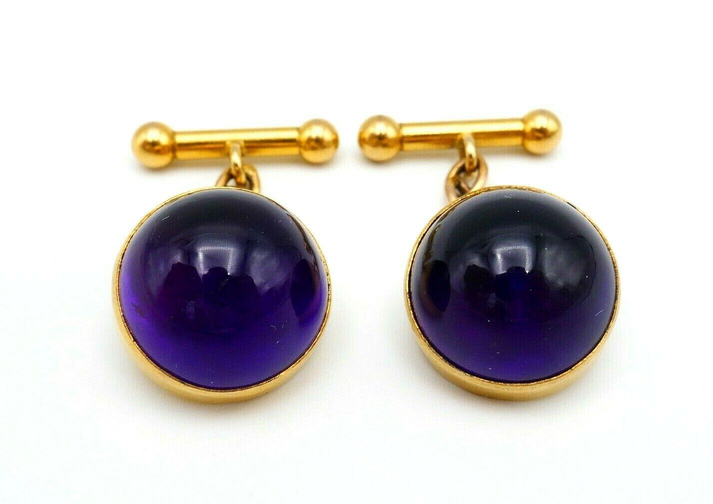 Beautiful antique cufflinks made of 9k (stamped) yellow gold and cabochon amethyst. 
Measurements: diameter is 5/8