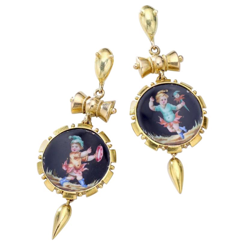 Boucles d
oreilles anciennes en or jaune et céramique