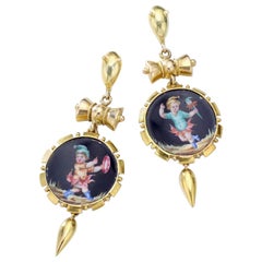 Boucles d
oreilles anciennes en or jaune et céramique