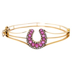 Antique Yellow Gold and Ruby and Diamond Horseshoe Bangle
