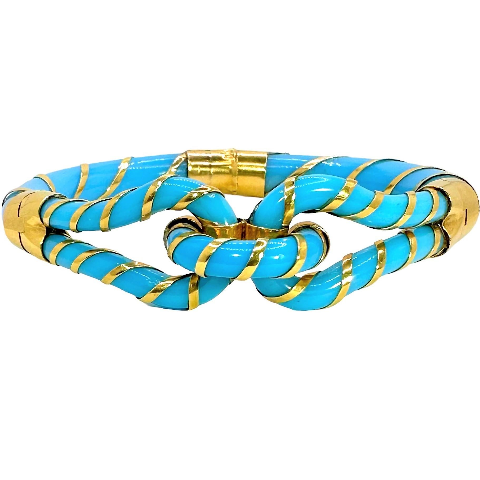 Imported into France in the early 20th century, this simple 18K bracelet features a knot design. The elegant use of the yellow gold, contrasts beautifully with the turquoise color, Venetian glass. The love knot joins two ends together, with a loop