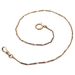 Chaîne de montre de poche en or jaune à maillons, avec attache pour chien et anneau à ressort