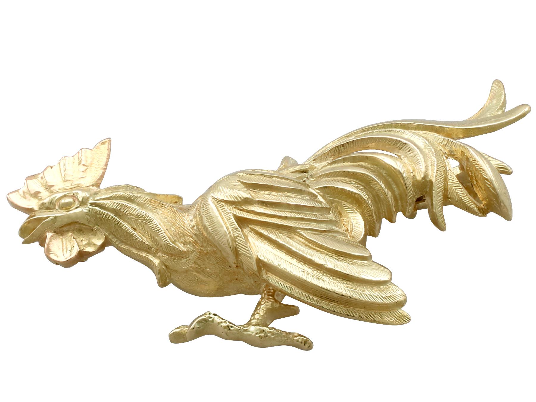 A fine and impressive 14 karat yellow gold brooch modelled in the form of a cockerel; part of our diverse antique jewellery and estate jewelry collections.

This fine and impressive antique cockerel brooch has been crafted in 14k yellow gold.

The