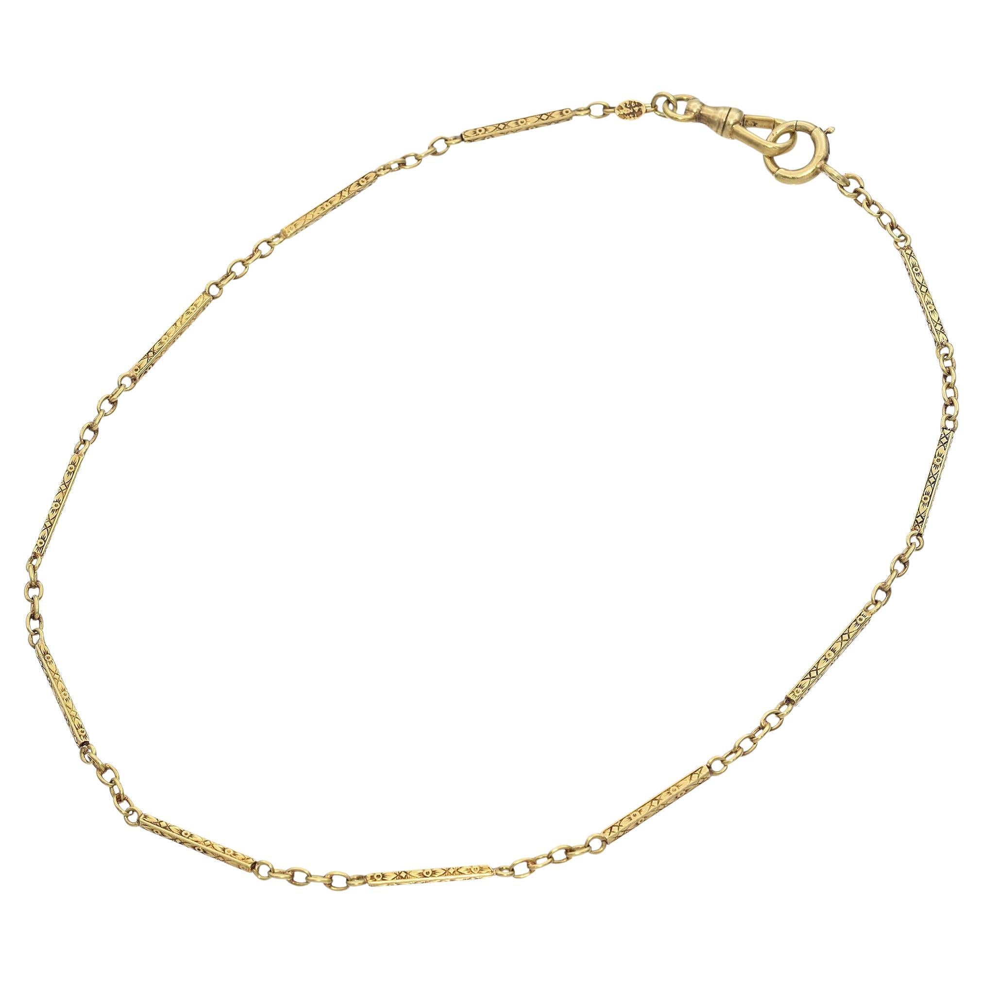 Chaîne de montre ancienne à barre gravée en or jaune de 14 pouces en vente