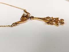 Pendentif filigrane ancien en or jaune avec diamants