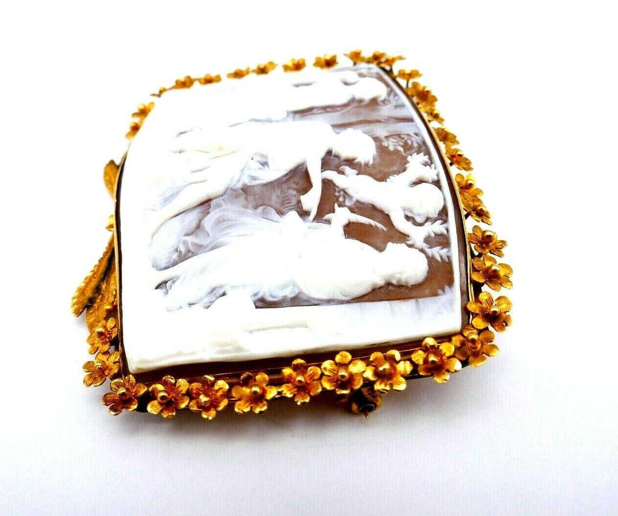 An amazing antique cameo brooch featuring a nicely carved Greek mythology scene. The frame is made of 14k gold (tested).
Measurements: 1 3/4