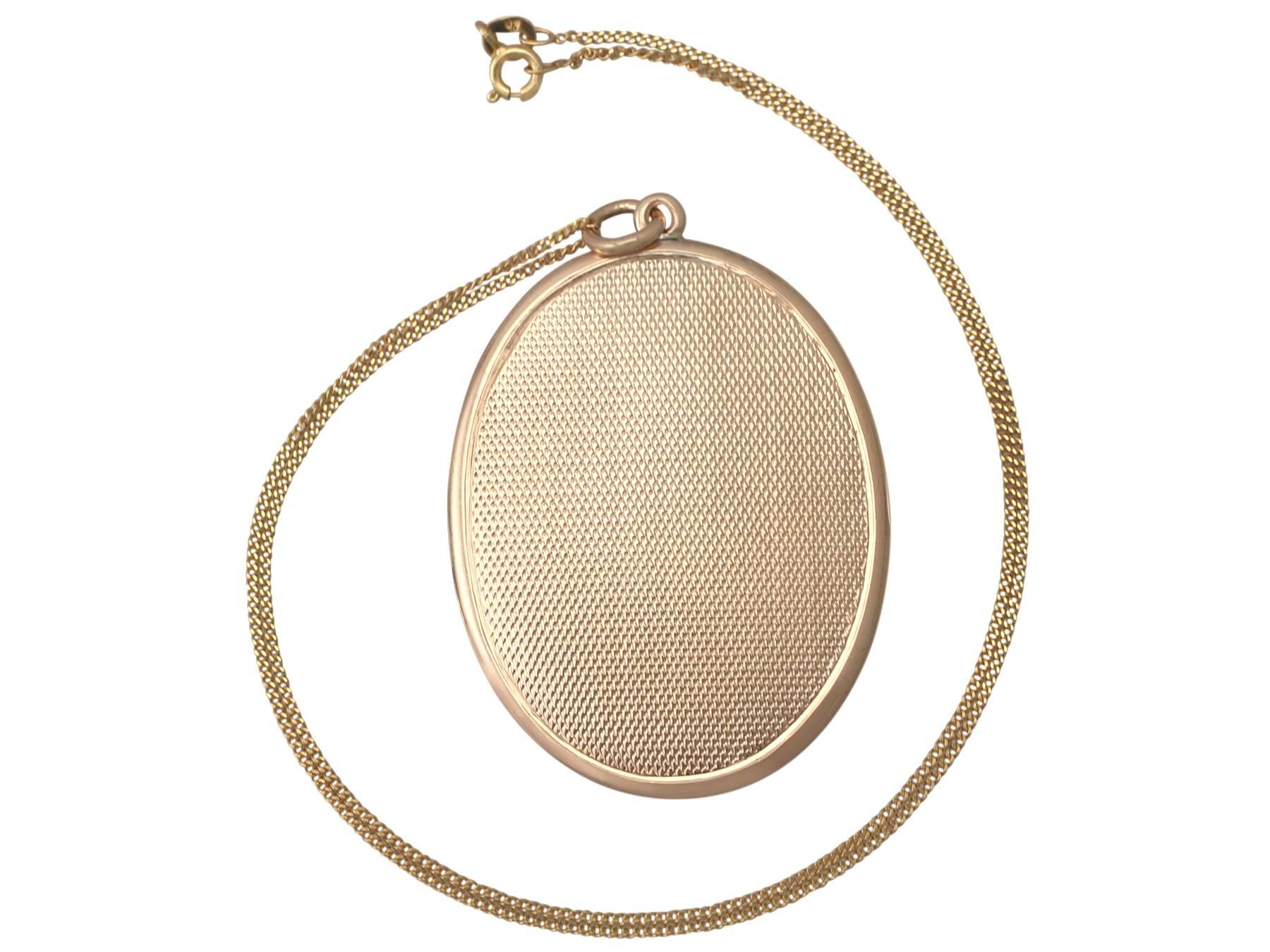 A fine and impressive antique Victorian 9 karat yellow gold locket pendant ; part of our diverse antique jewelry and estate jewelry collections.

This fine and impressive, large antique locket has been crafted in 9k yellow gold.

The hinged locket