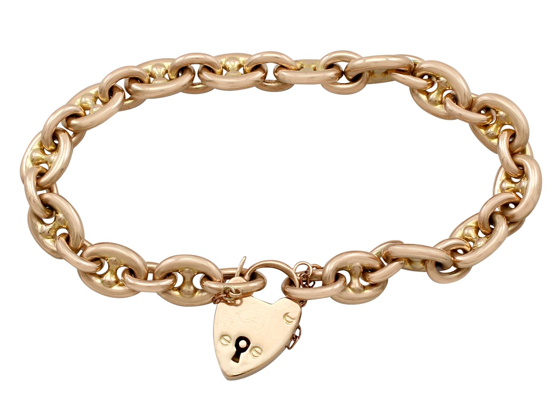 An impressive antique 9 karat yellow gold mariner link bracelet with heart shaped padlock clasp; part of our diverse antique jewellery and estate jewelry collections.

This fine and impressive antique Victorian bracelet has been crafted in 9k yellow