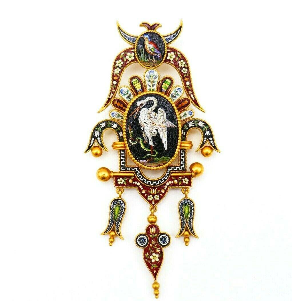 An amazing antique micro mosaic set consists of a pair of earrings and a pendant/brooch.
Made of 14k yellow gold and micro mosaic with bird and flower motifs. The dangling earrings have original screw backs stamped with a hallmark for 14k gold. The