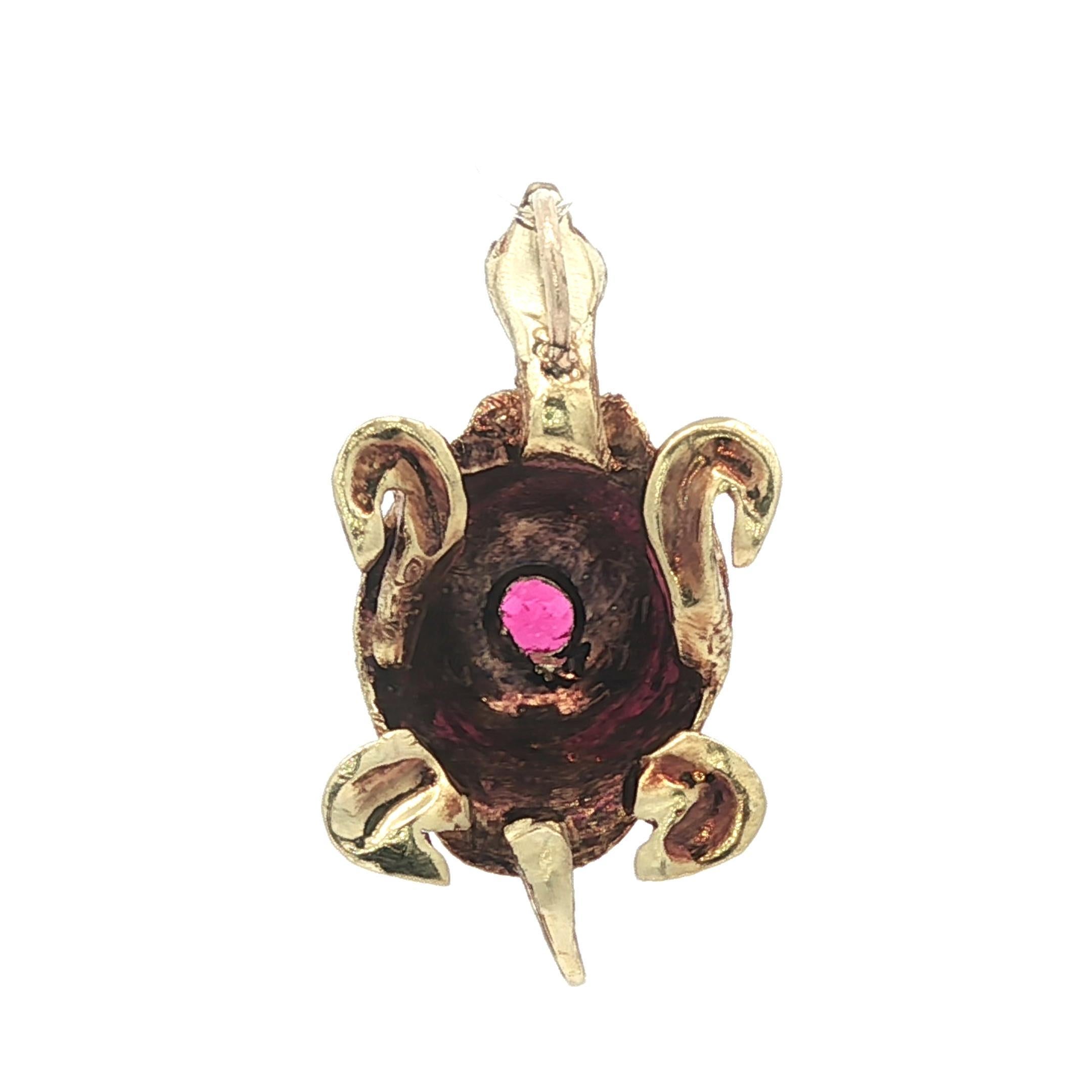 --Stone(s):--
(2) Natural Genuine Sapphires - Round Cut - Bezel Set - Blue Color - On Eyes - 0.9mm each (approx.)
(1) Pink Stone - Old Mine Cut - Pave Set - Pink Color - 3.8mm (approx.)

Material: Solid 18k Yellow Gold 
Total Weight: 3.57