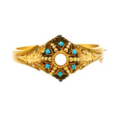 Bracelet jonc ancien en or jaune avec perles et turquoises