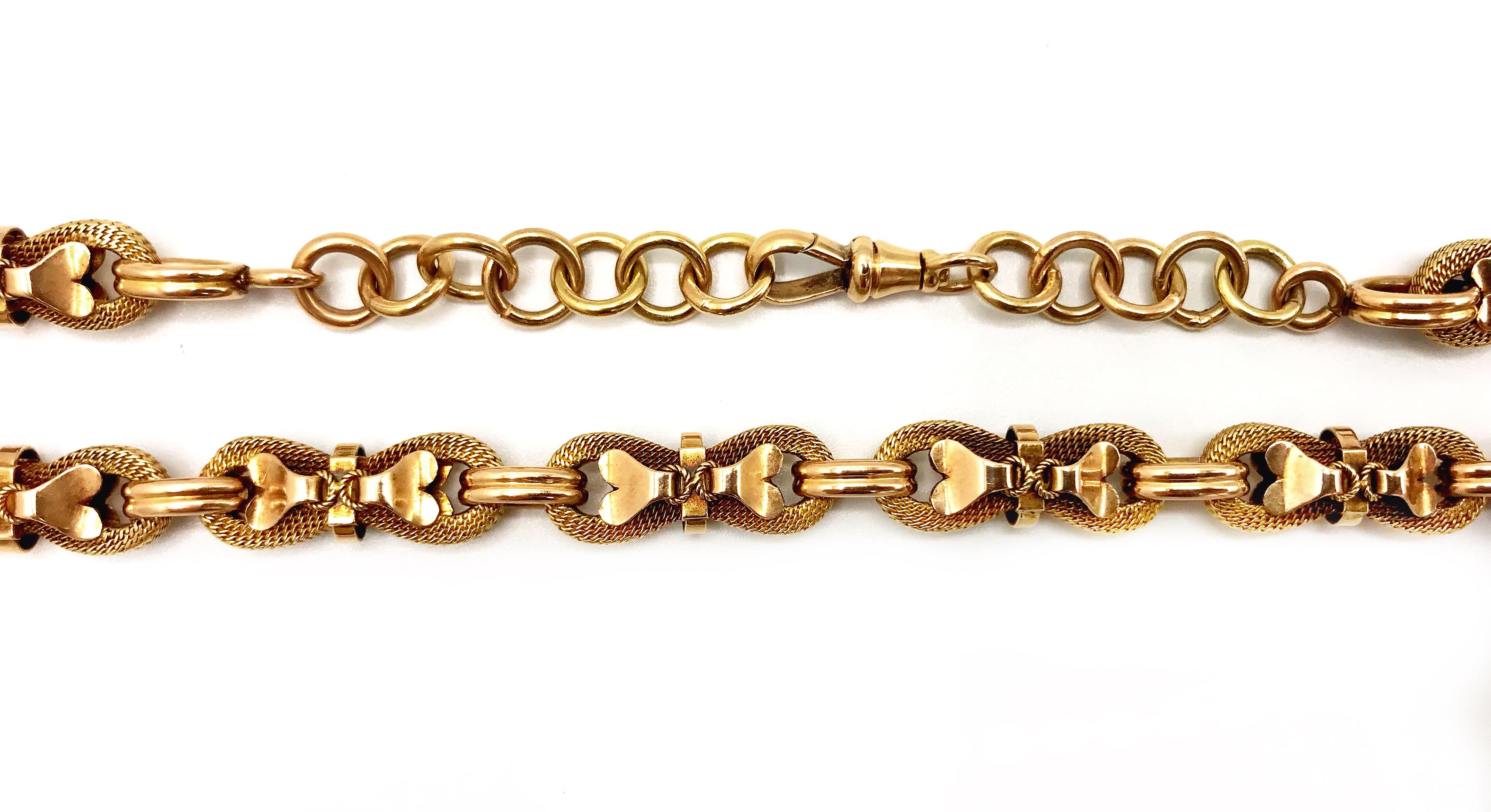 Gorgeous unusual Antique watch chain necklace made of 18k yellow gold. Extension (the top part with a clasp) was added later and is made of 14k gold. 
Links are consist of braided 