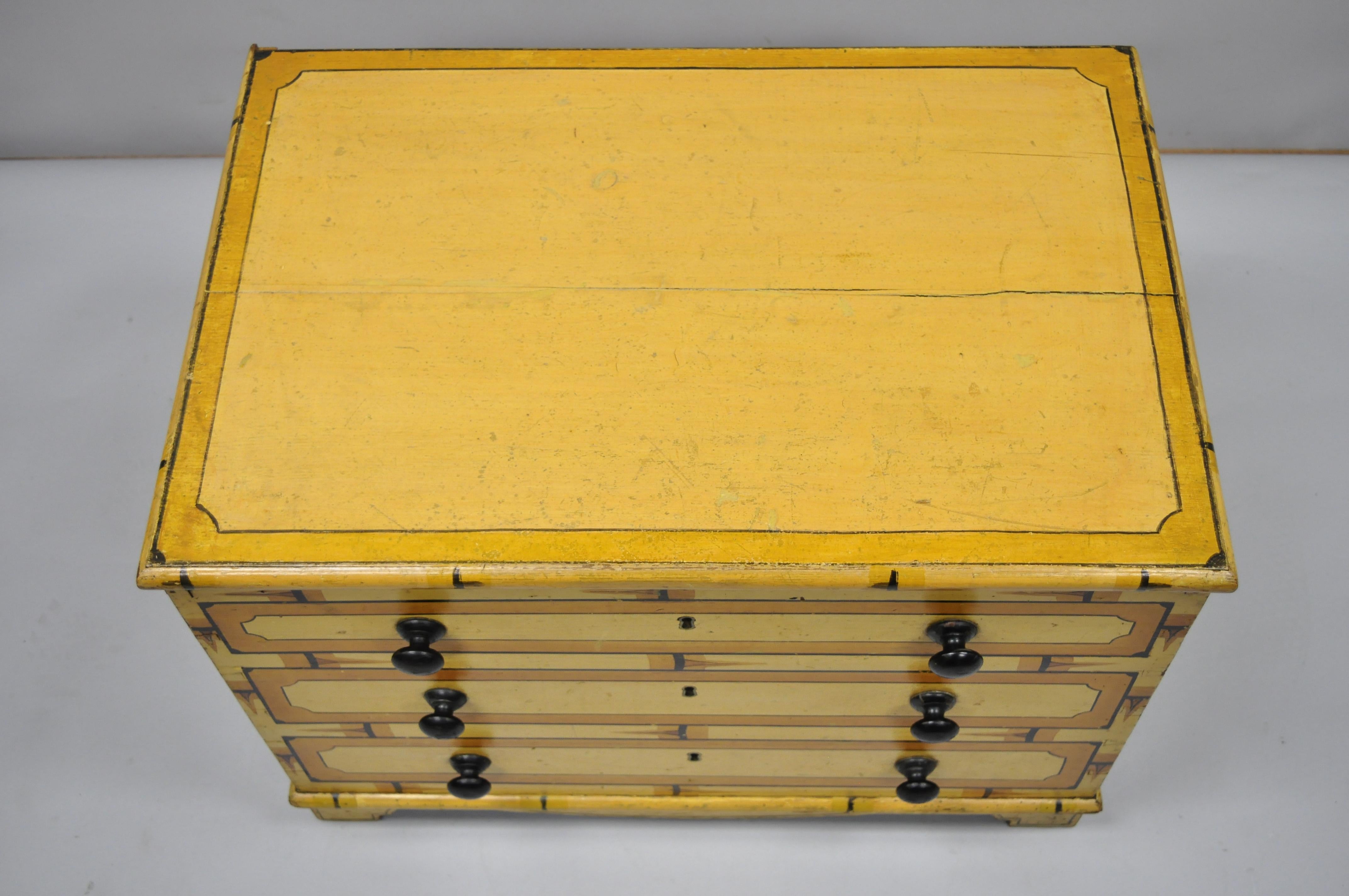 19th Century Antique Yellow Painted Cottage Primitive Folk Art Small Trunk Faux Spool Cabinet For Sale