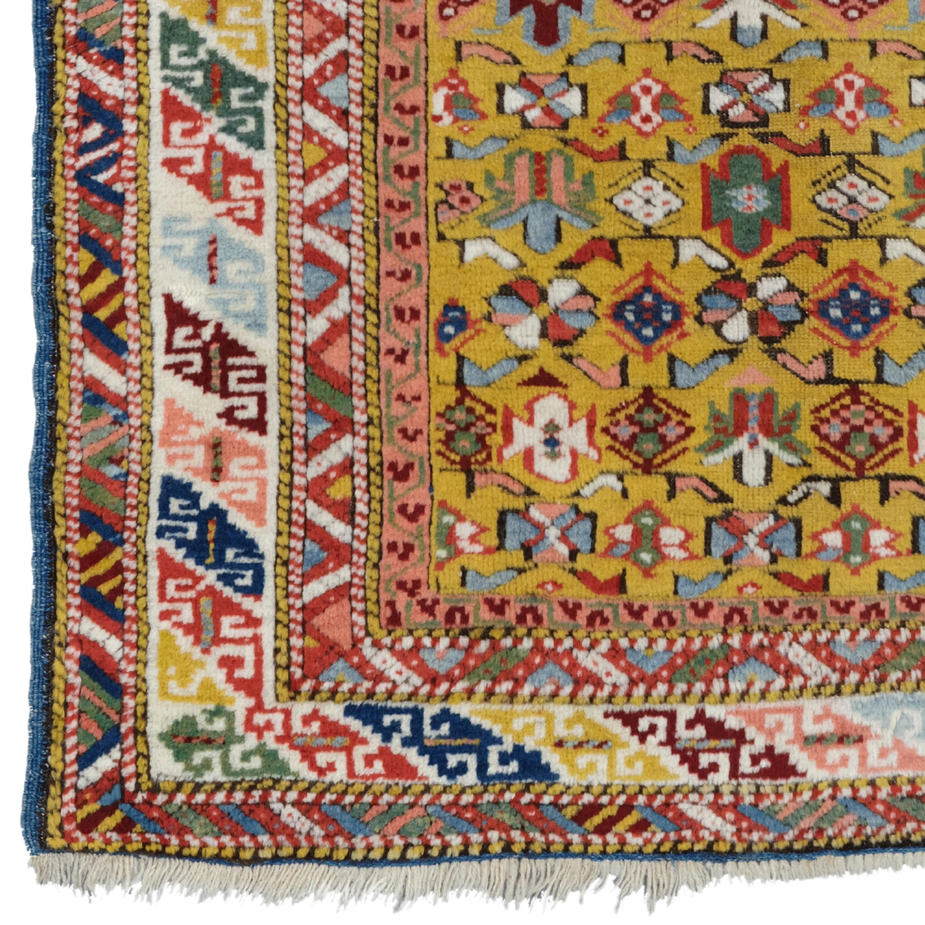 Yellow Ground Shirvan Rug Circa 1880
Size : 104 x 160 cm

This impressive 1880s antique yellow Shirvan rug is expertly woven with carefully selected woolen threads. Geometric patterns and motifs in various colors embroidered on a rich yellow