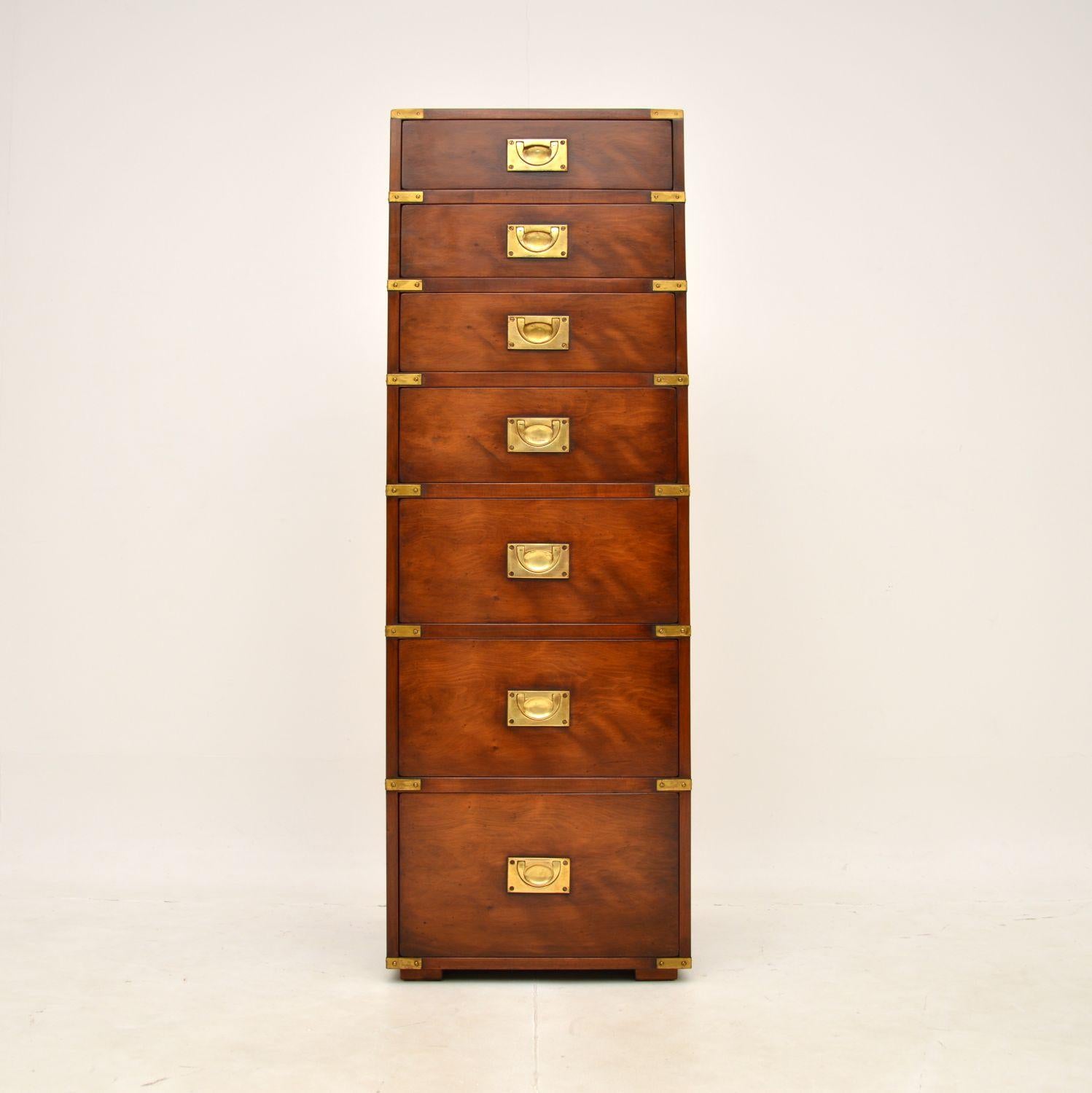 A superb antique yew wood military campaign chest of drawers. This was made by Kennedy furniture and was retailed in Harrods, it dates from around the 1960-70’s.

It is of exceptional quality, it is very heavy with solid oak construction and