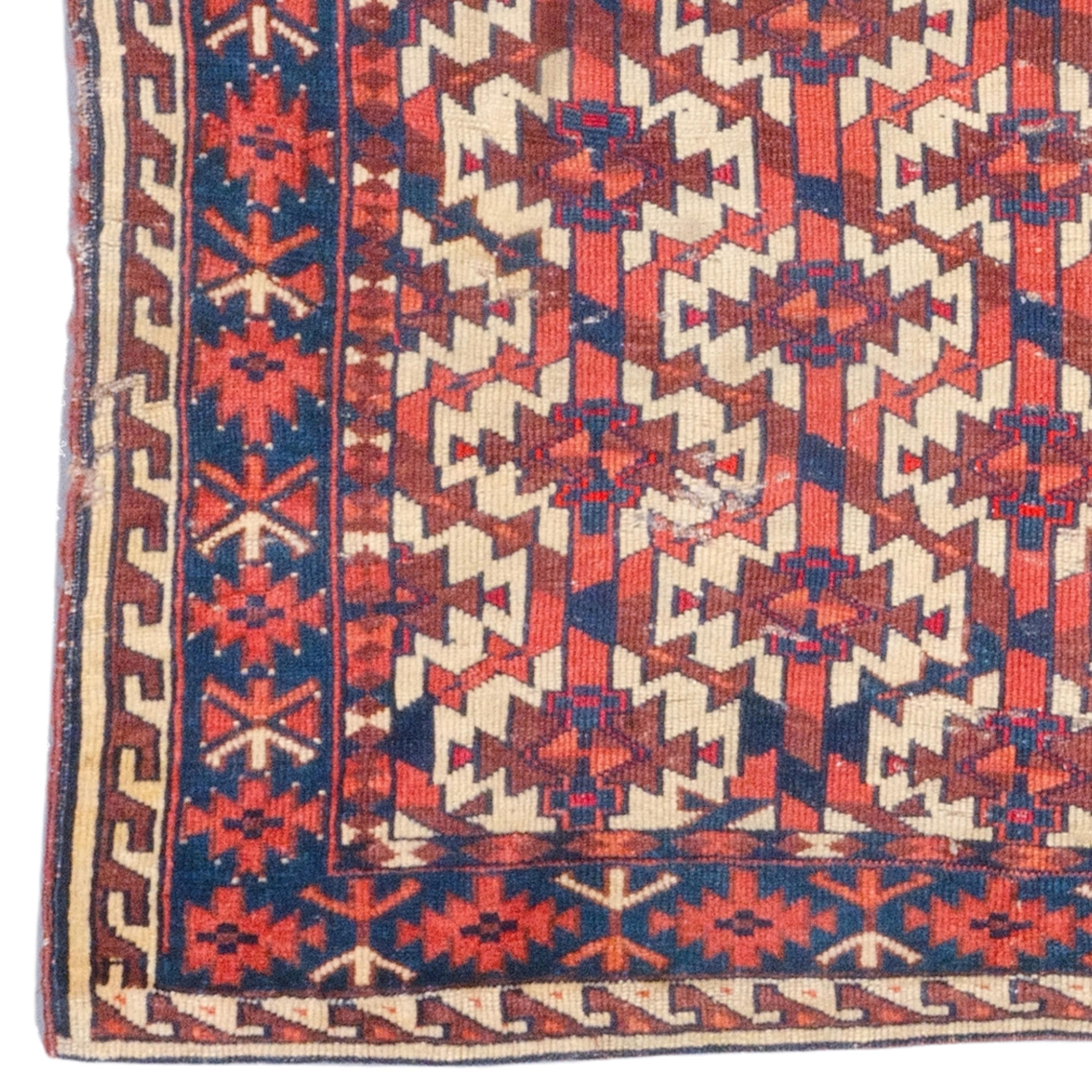 A Unique Piece of the 19th Century: Antique Turkmen Yomud Hanging Carpet

This elegant 19th century Turkmen Yomud Asmalyk rug is a work of art that can enchant any space with its carefully woven details and vibrant colors. Geometric patterns in rich