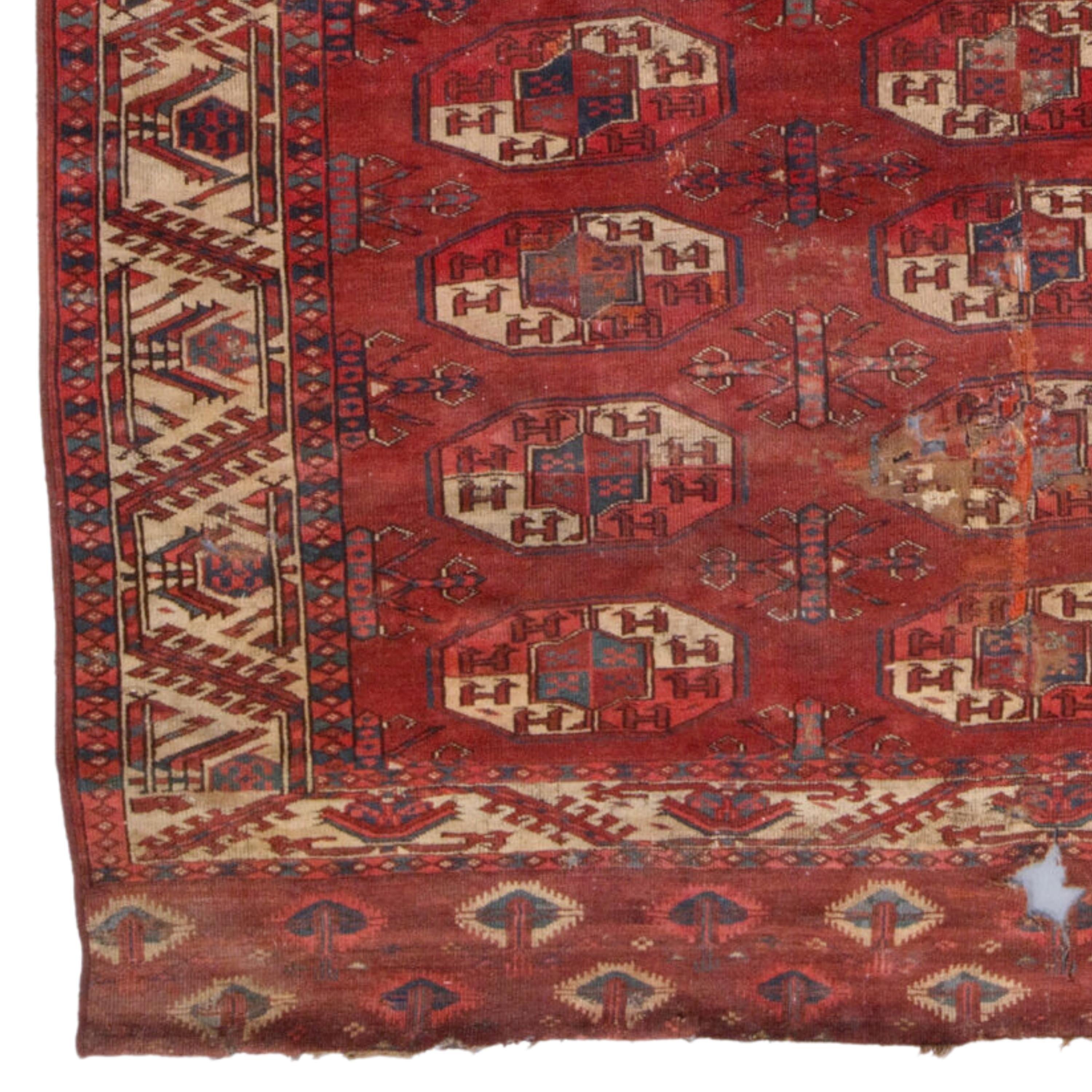 Antique Yomud Main Carpet - Early Turkmen Yomud Main Rug
Circa 1800   Size 167 x 246 cm (5,47 - 8,07 ft)

This unique Yomud main carpet from the 1800s adds nobility to any space with its rich history and elegant craftsmanship. Its vibrant red colors