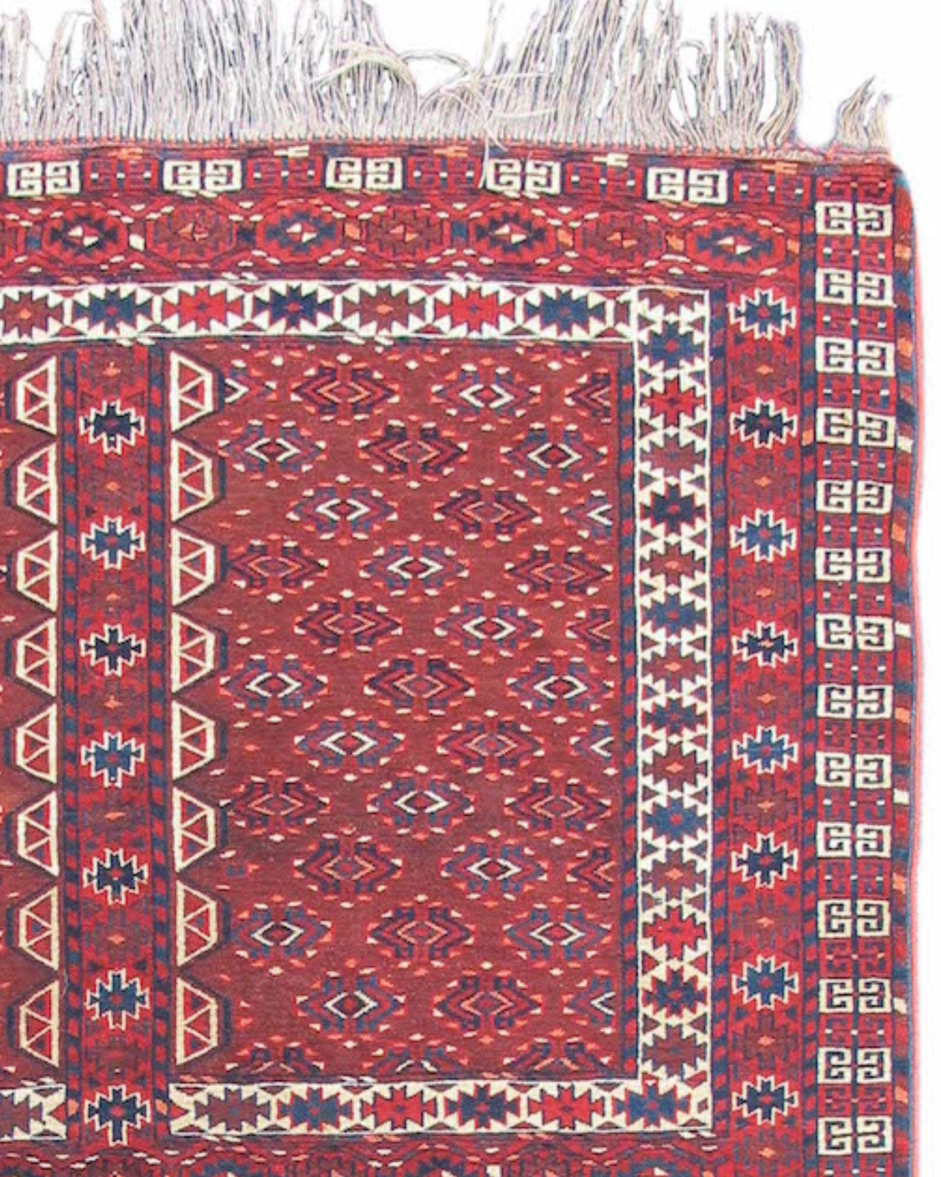 Antique Yomut Ensi Rug, Late 19th Century

An ensi is a rug woven as a door flap for the inside of a Turkmen yurt. This Yomut group ensi draws a cruciform pattern mimicking the design of Central Asian wooden doors. The bottom panel, or ‘elem’