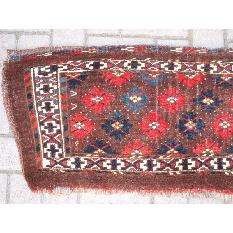 Antique Yomut Turkmen torba with great design and colour. One of a pair.

Additional information:
Origin: Turkmenistan
Age: Circa 1880
Size: 3ft 9in x 1ft 4in (115 x 40cm).
 