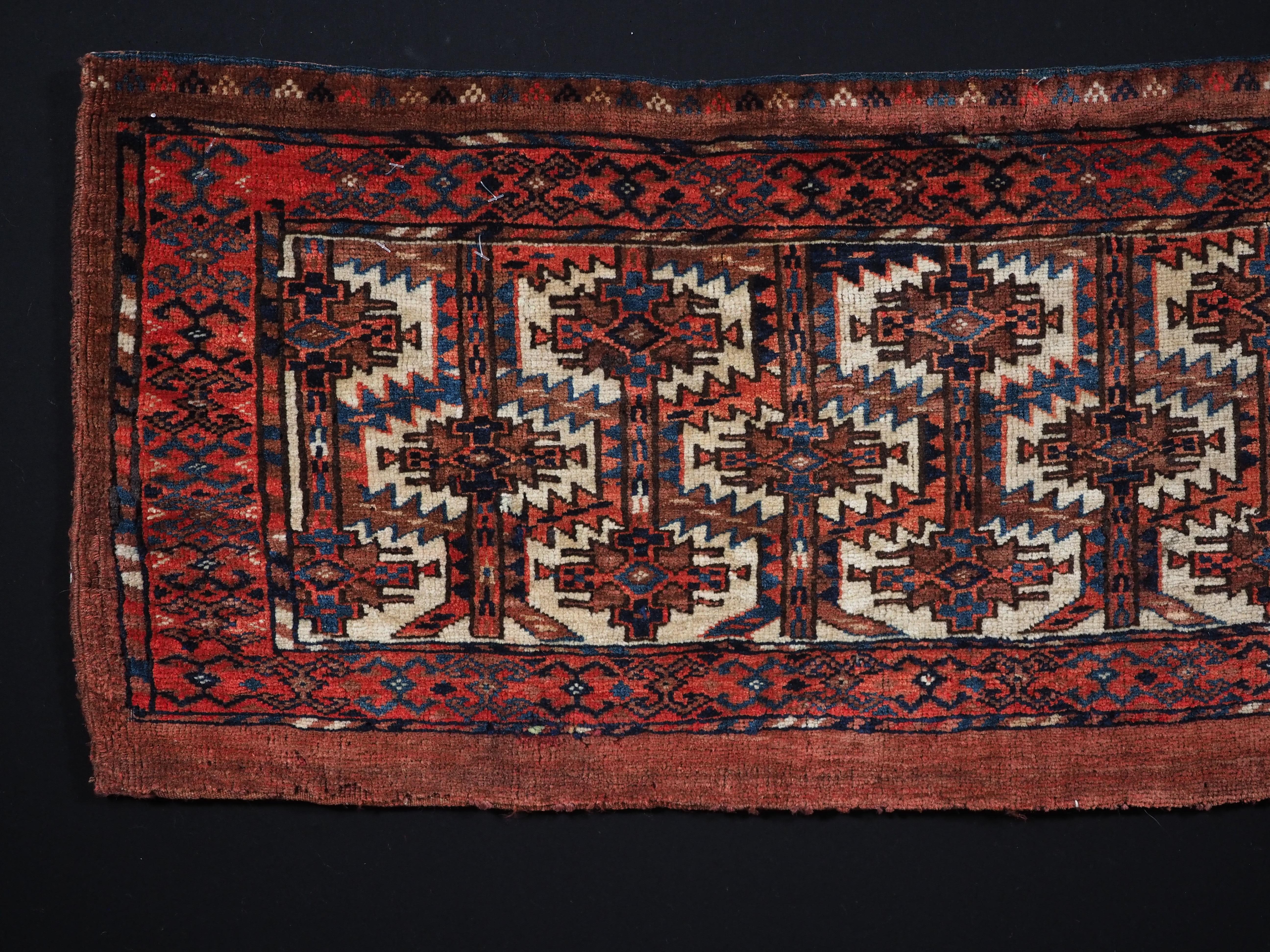 Size: 3ft 3in x 1ft 4in (100 x 41cm)

Antique Yomut Turkmen torba with lattice design.

Circa 1880.

Torba are shallow wall bags used mainly in tents or yurts for the storage of personal belongings, they were also used to decorate the sides of a
