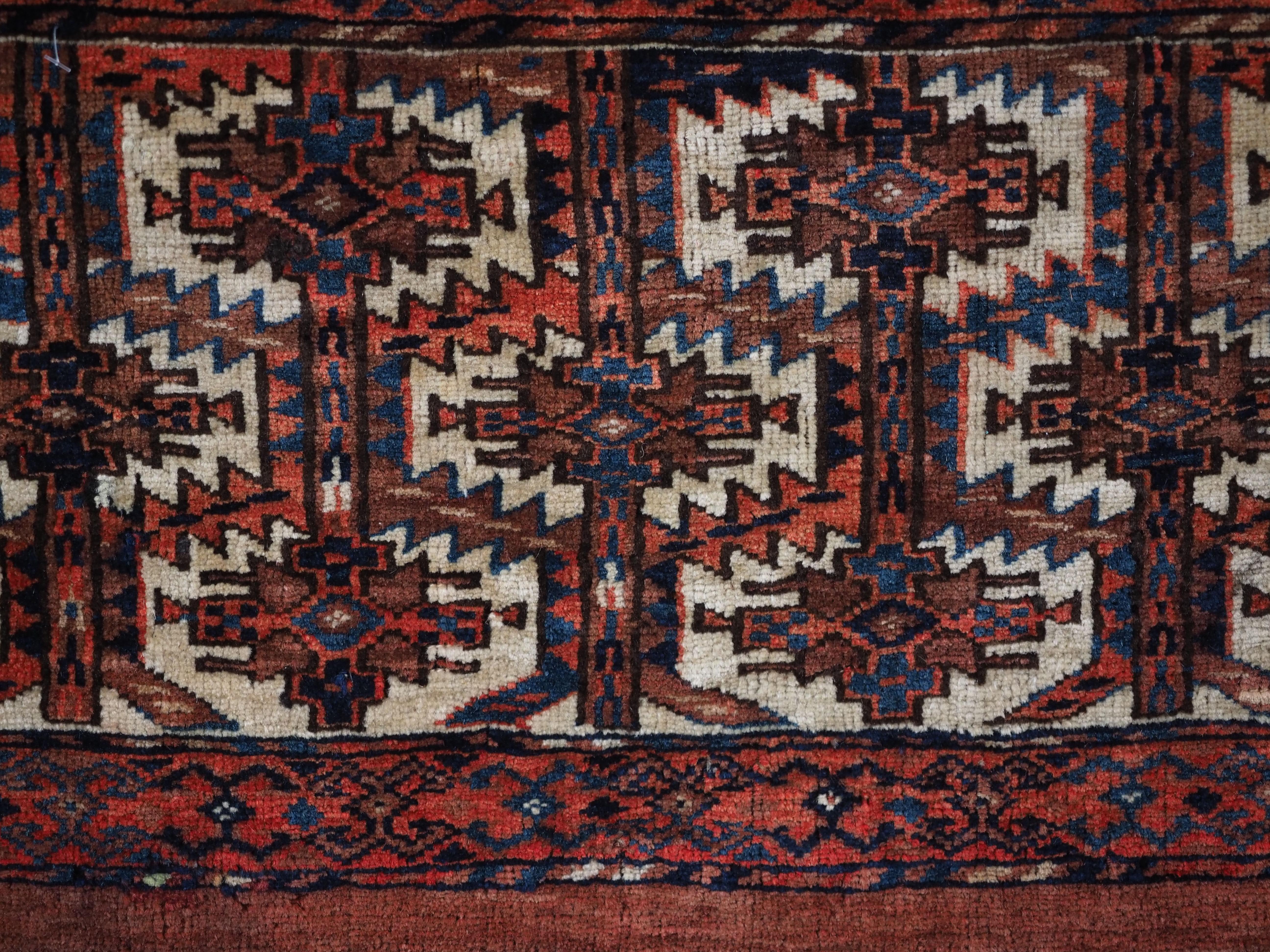 Wool Antique Yomut Turkmen torba with lattice design.  Circa 1880. For Sale