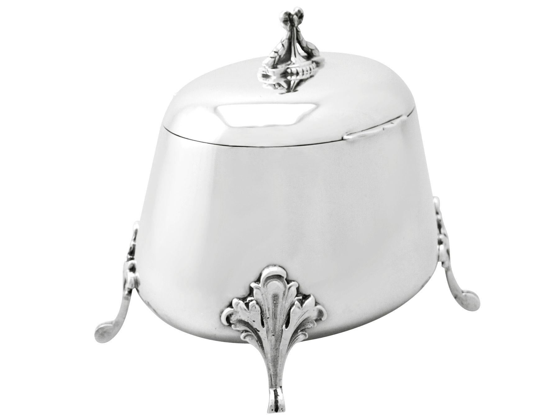 A fine and impressive antique Yugoslavian silver tea caddy; an addition to our silver teaware collection.

This fine antique Yugoslavian silver tea caddy has an oval rounded, tapering form.

The surface of the box is plain and