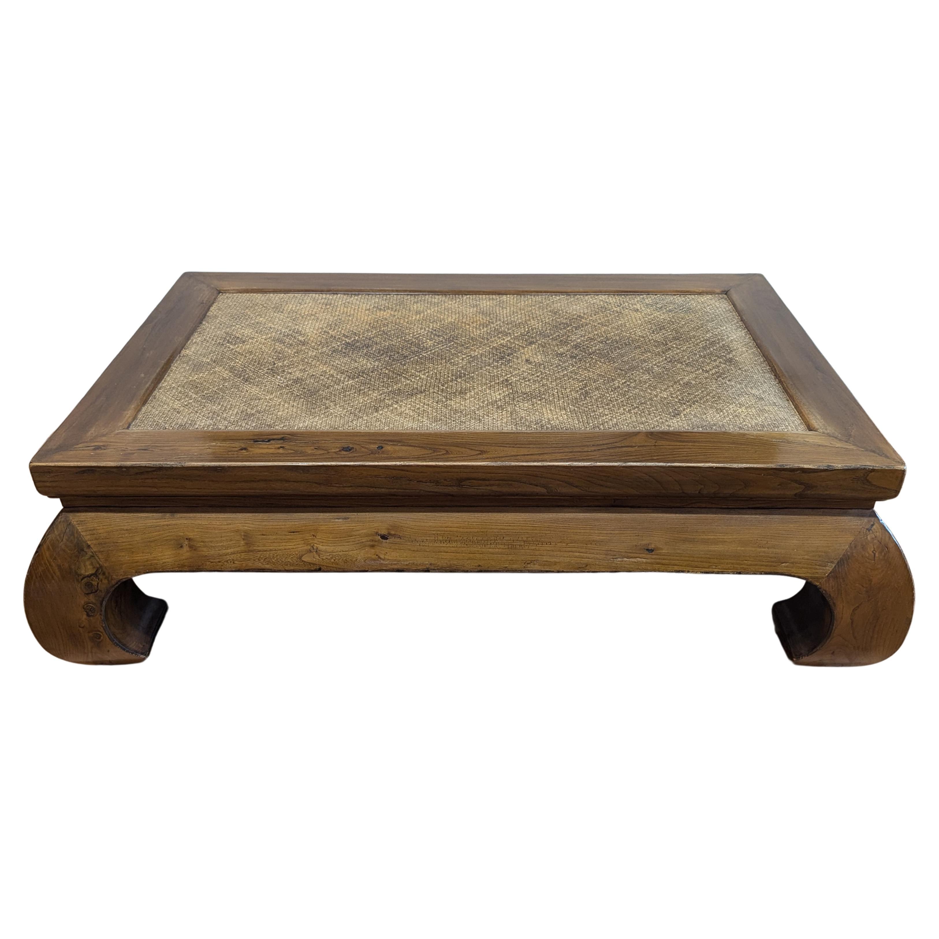 A spectacular Antique Ming style Yumu (elm) wood Chow Leg coffee cocktail table.  Solid Yumu (Elm) wood with a woven rattan top inset.   Full of  character and charm Antique Chinese Ming Dynasty Style coffee table. Timeless design, awesome