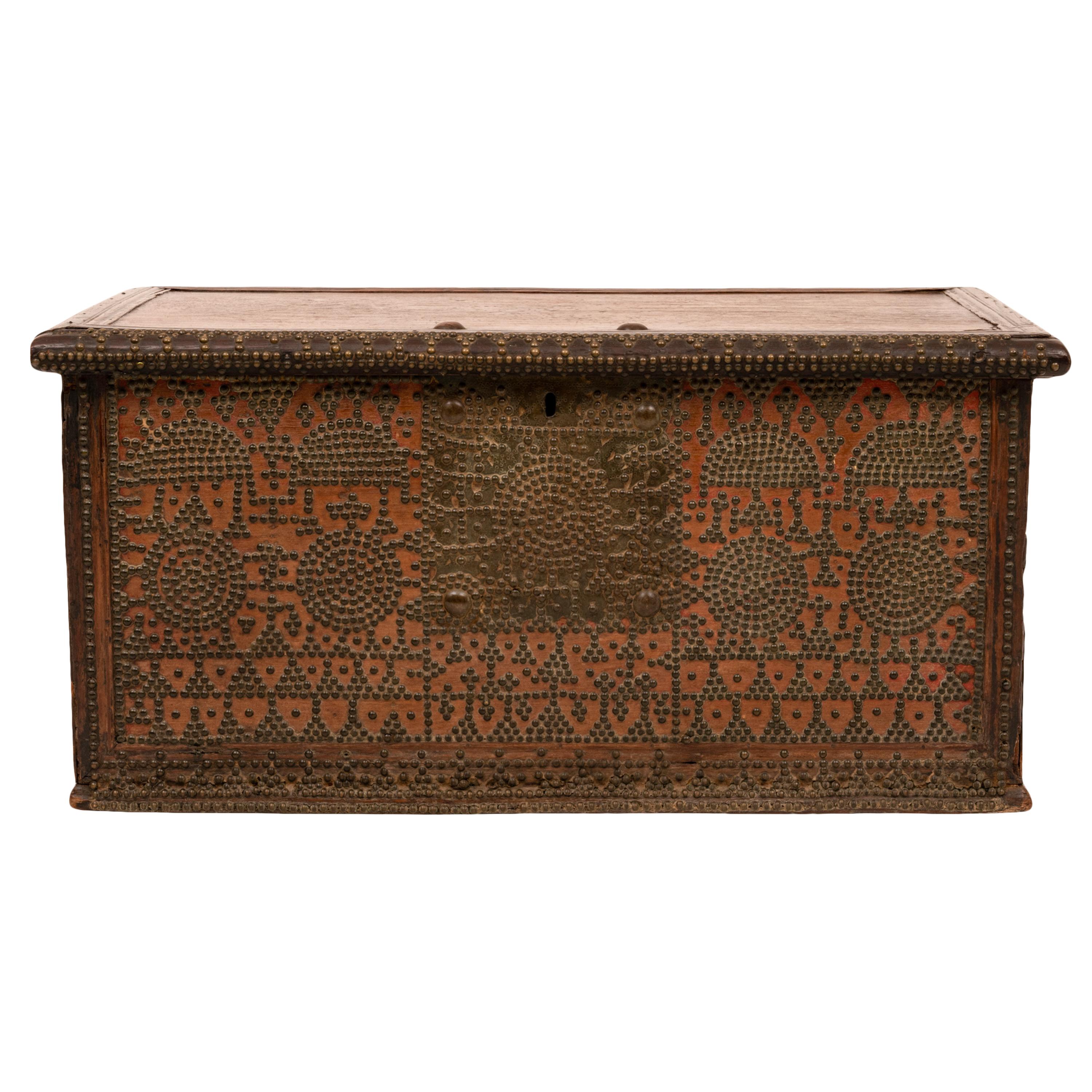 A good antique early 19th century Zanzibar or Omani teak and studwork dowry chest, circa 1820.
These chests were made made throughout the Arab world, this is an early 19th century version made of teak & elaborately decorated with brass studwork,