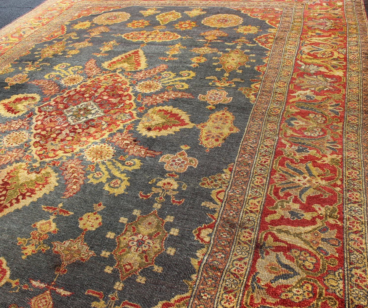 Late 19th Century Antique Zeigler Sultanabad Rug with Elegant Medallion Design in Blue & Rust Red For Sale