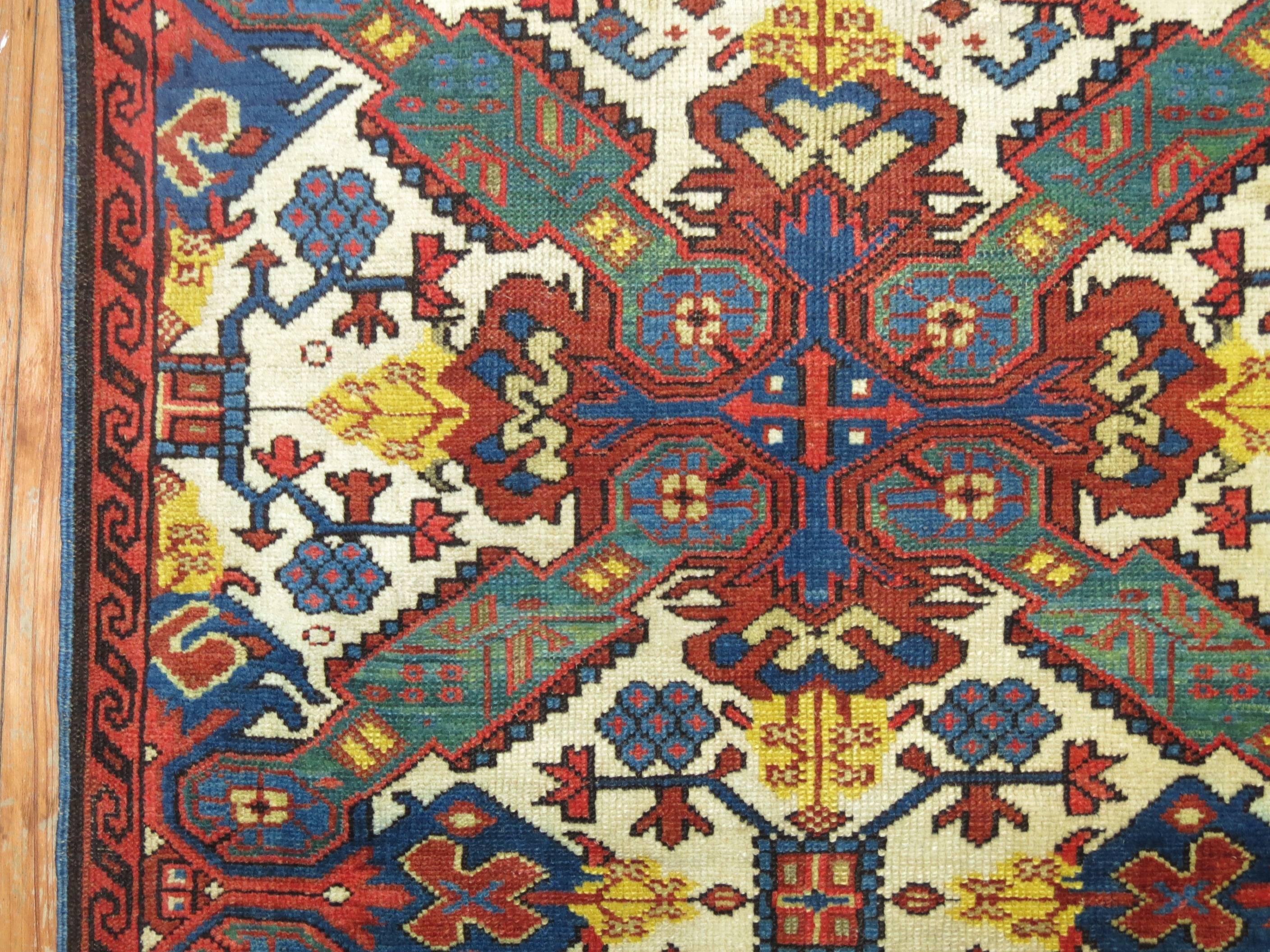 A late 19th century Caucasian Zeychour Kuba rug.

2'7'' x 3'9''

A subtype of the Kuba rug, antique Seychour (also known as Seichur and Zeychour) rugs are made in the small town of Yukhari-Zeykhur in Azerbaijan in the Northeast Caucasus. Prized for