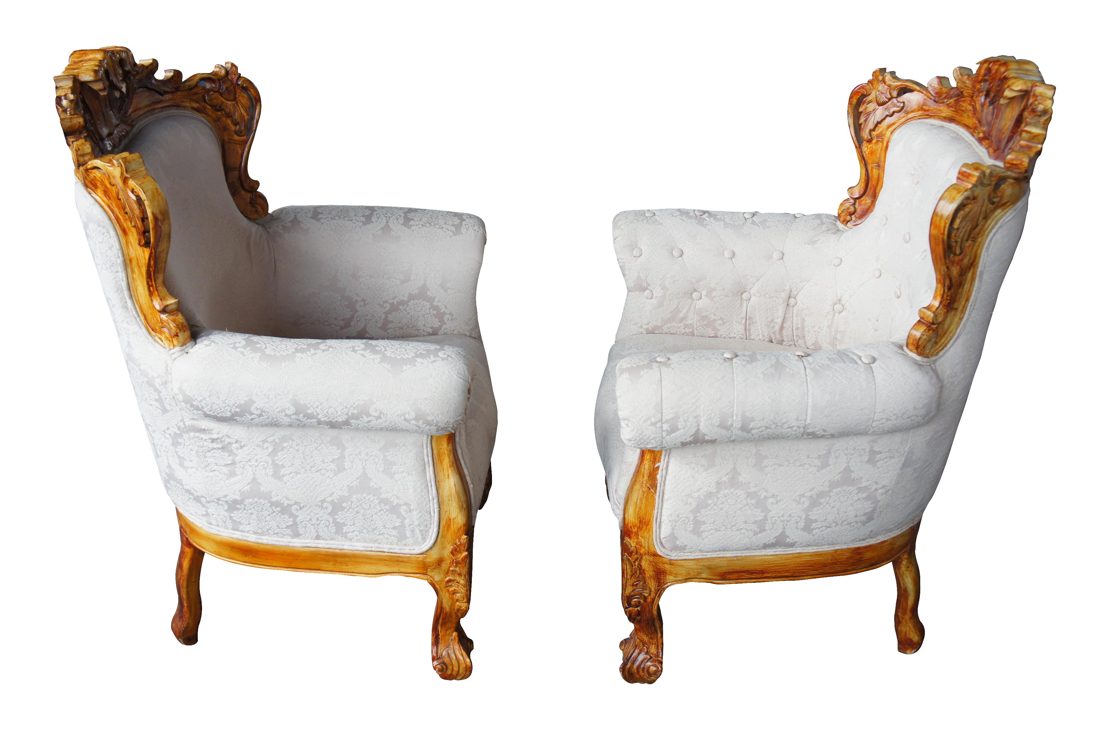 Antiqued Baroque Rococo high relief carved club chairs continental brocade seat

Exceptional Baroque Rococo designed club chairs. Features high relief scalloped floral carvings. Upholstered in a brocade fabric. Both chairs have the same fabric,