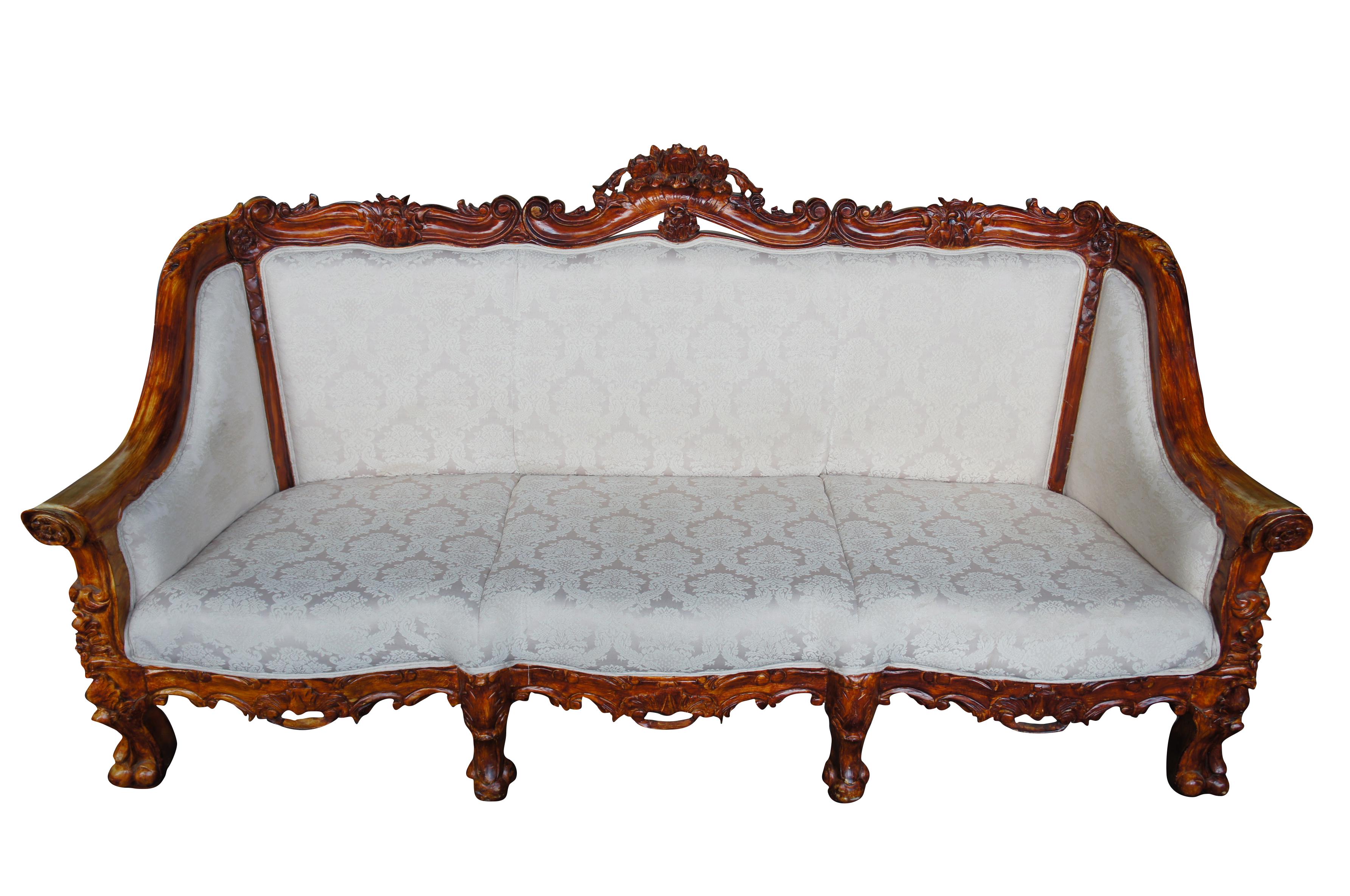 Antiqued baroque rococo high relief carved settee continental sofa brocade seat

Exceptional baroque rococo designed sofa. Features high relief scalloped floral carvings. Upholstered in a brocade fabric. The perfect statement for any