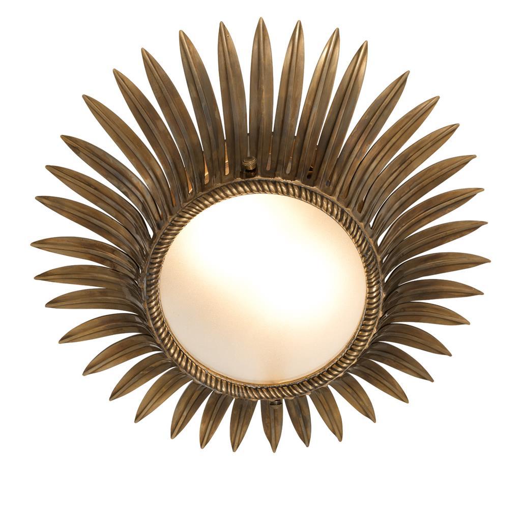 Vintage style aged brass flush mount ceiling lamp with frosted glass diffuser.