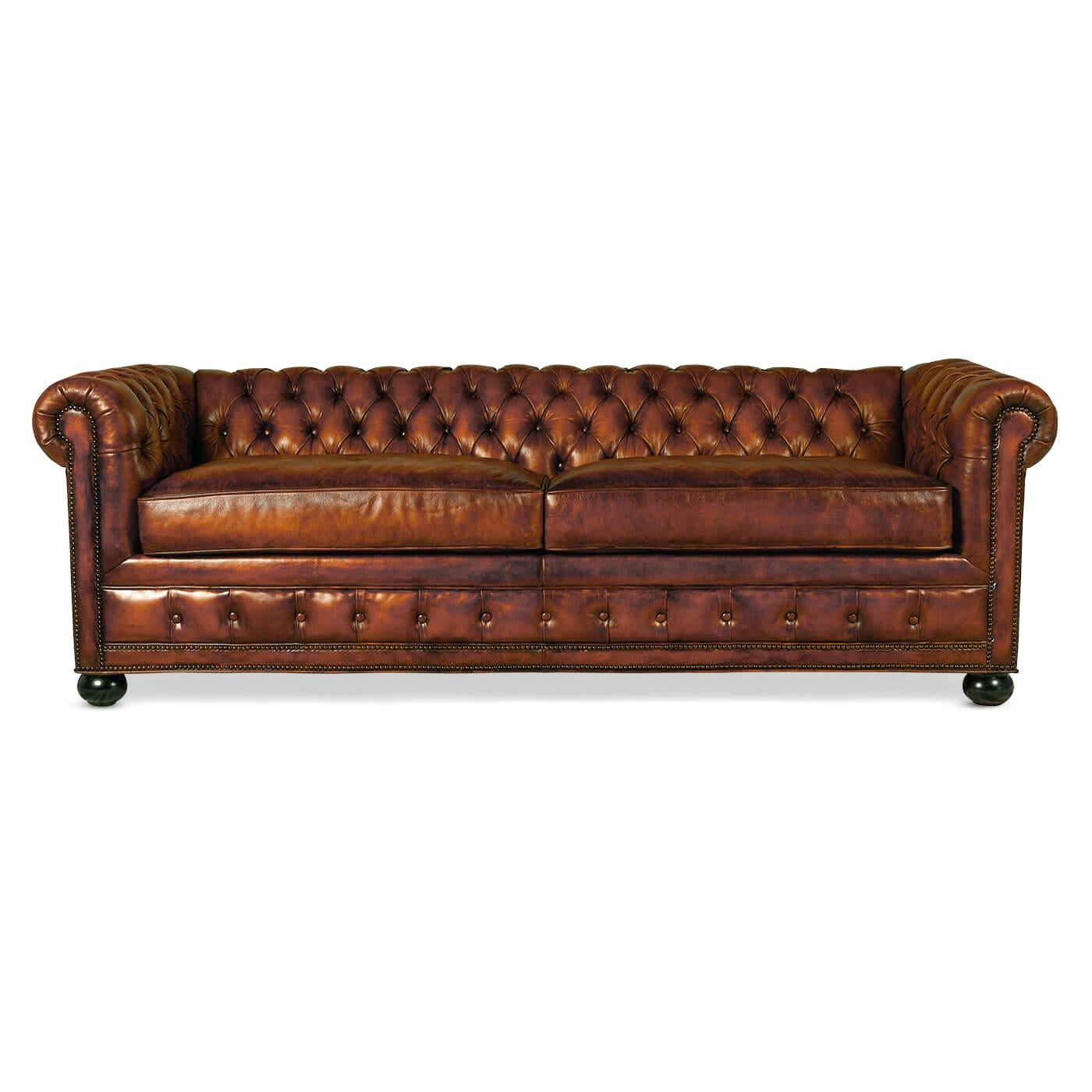 A Classic antiqued Chesterfield leather sofa. This beautiful hand-rubbed and antiqued leather Chesterfield sofa is beautifully crafted and artistically antiqued to look and feel like a vintage leather sofa.

This top grain leather Chesterfield