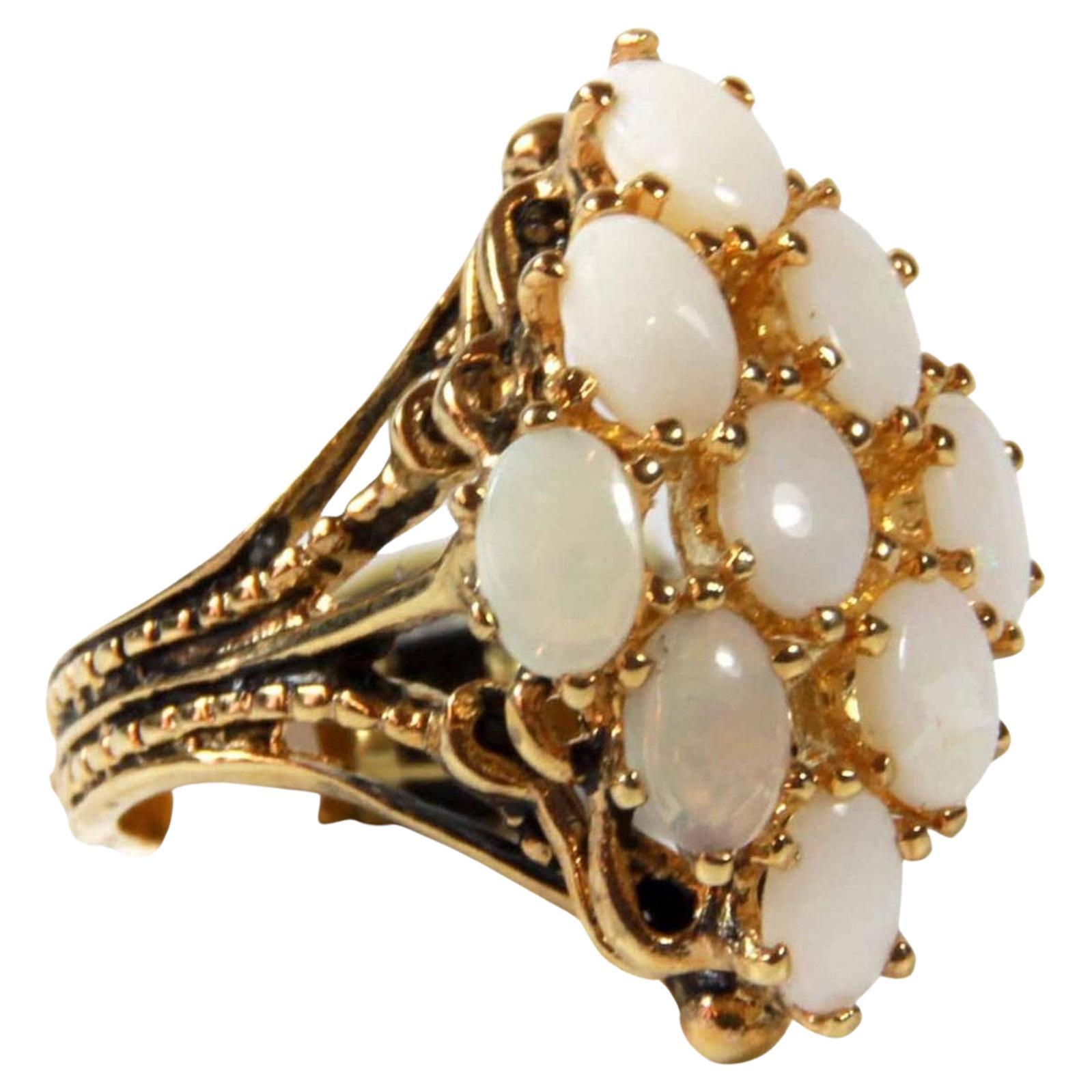 Chic yet, charming this antiqued genuine opal cocktail is sure to catch the attention by making a statement, whether you are dressed up or dressed down this statement ring will certainly, lend you give a polished look!

Made by the American ring