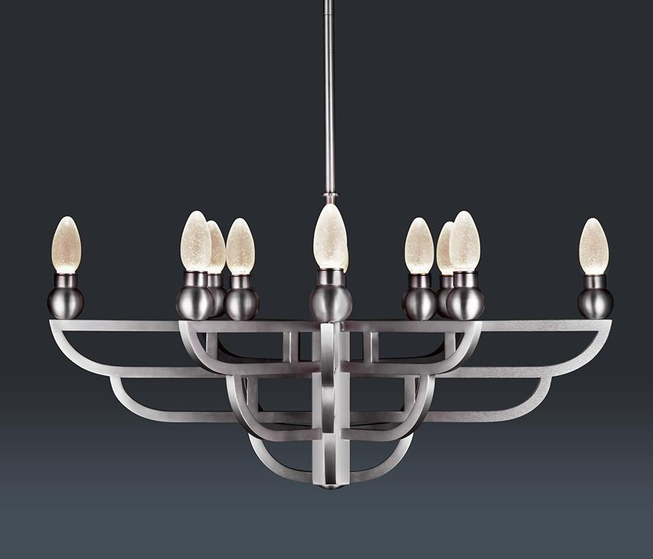 Adelphi stainless steel outdoor Chandelier by Elisterno - bringing a new level of luxury to outdoor spaces.  Elisterno Outdoors specializes in outdoor lighting with designs and construction inspired by classic European styles but engineered with