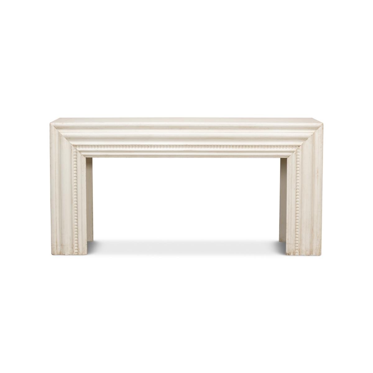 Traditional Antiqued white painted mantel console table. Made with reclaimed pine with a bold frame having molded architectural elements and dental moldings. Reminiscent of an 18th-century antique mantel.

Dimensions: 72