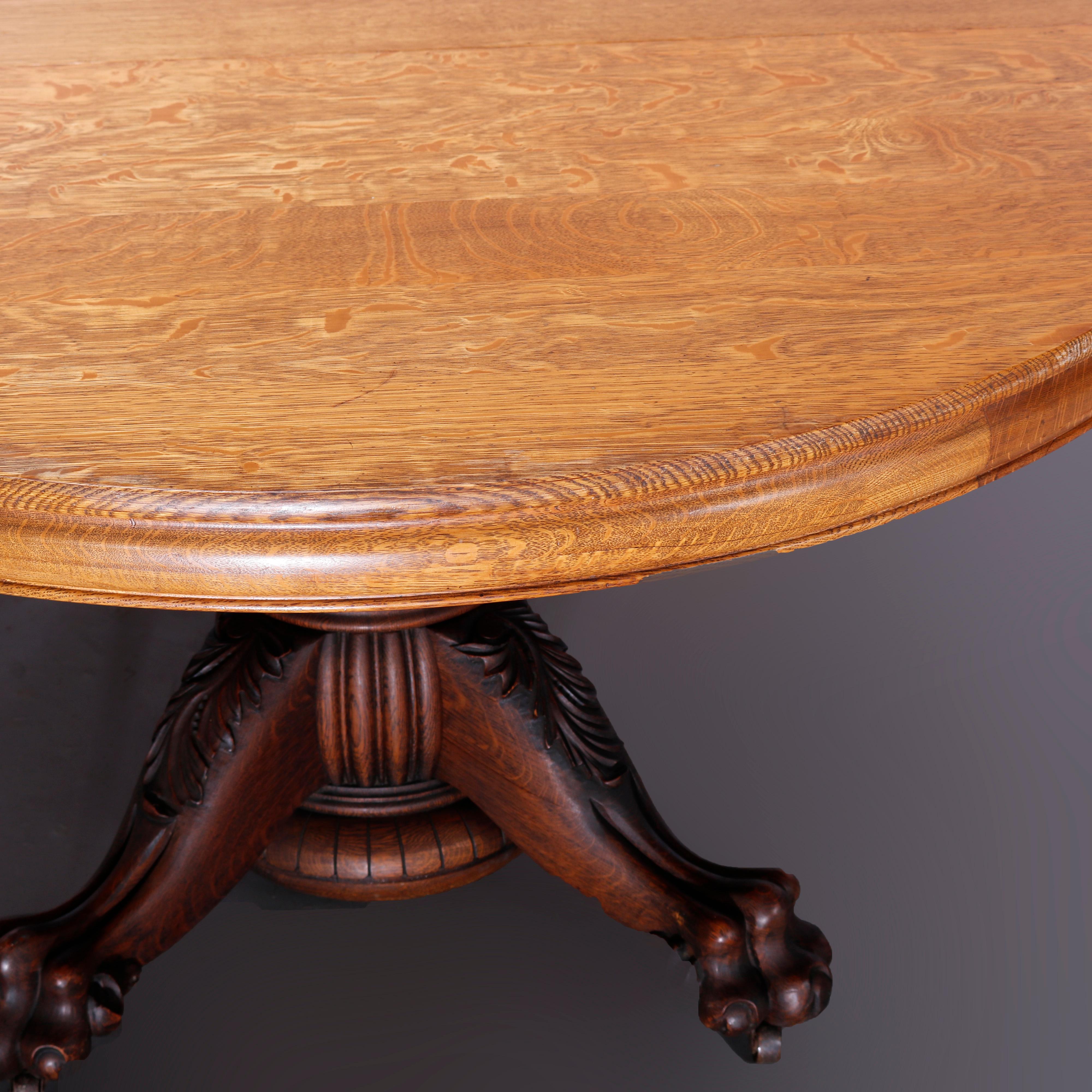 AntiqueHastings Table de salle à manger de style banquet en chêne rond sculpté à pieds griffes et 5 feuilles, vers 1910 4