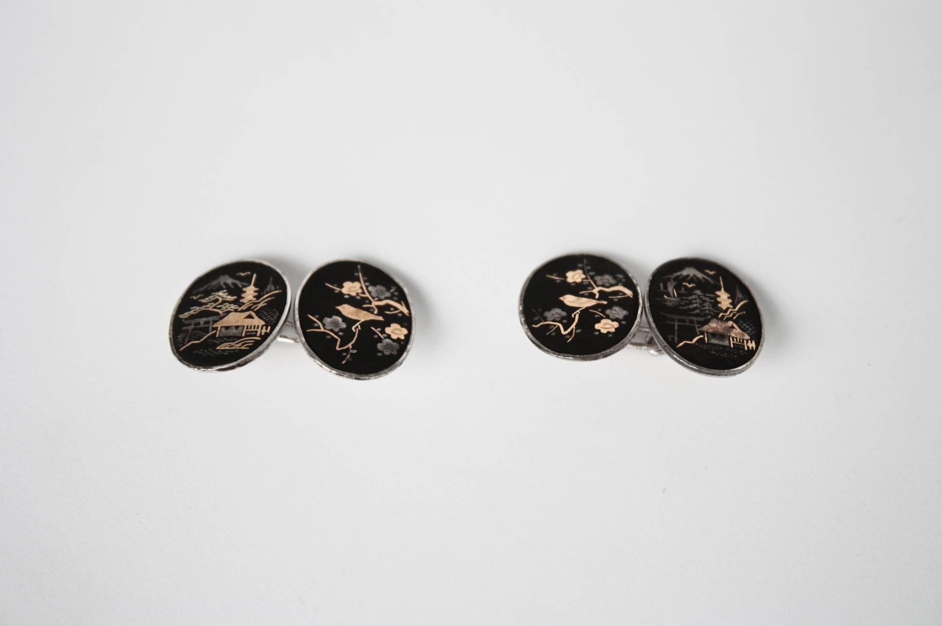 Antiques  1920 Japanies Cufflinks with classic Japanies landscape and floral details black lacquer silver gold.