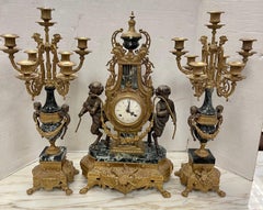 Antiques Louis XVI French Bronze and Marble Garniture Set Clock & Candelabras