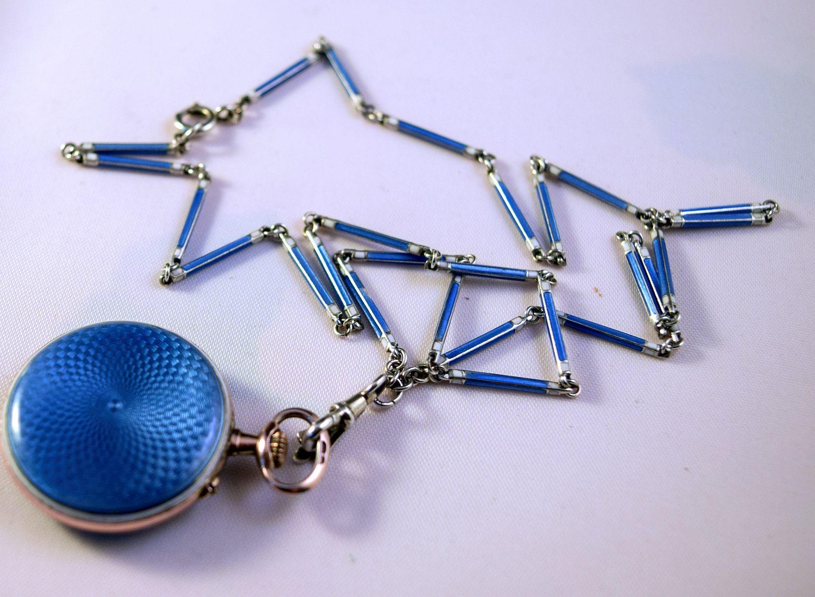 Early 20th Century European Silver Blue enamel Ladies Fob Watch
on a blue matching enamel link chain.
Vey good condition for the age watch is in very good running condition.
Inside back is stamped with silver hall marks 0.935
Which is the purest