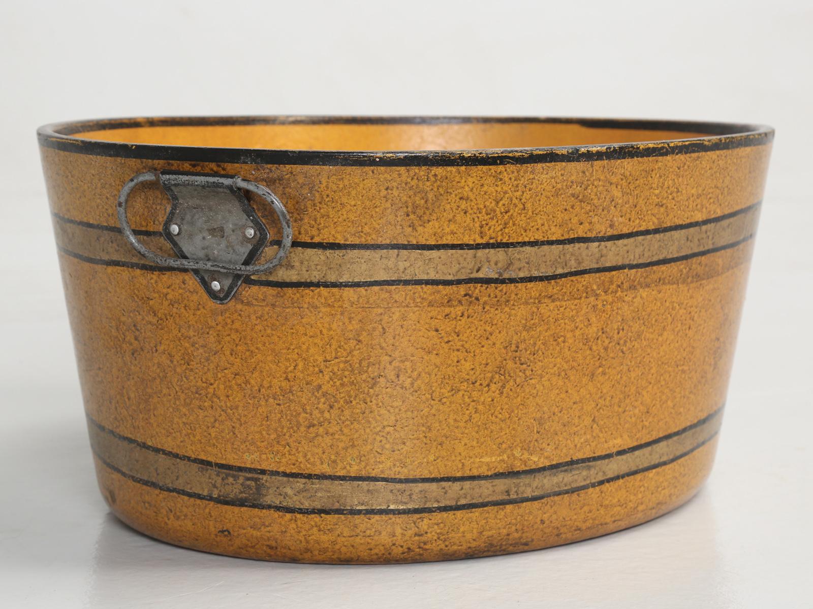 Wonderful French Paper-Mâché bucket, in a gorgeous shade of ochre. No visual damage, nor any repairs. Could possible make a nice Wine Bucket?