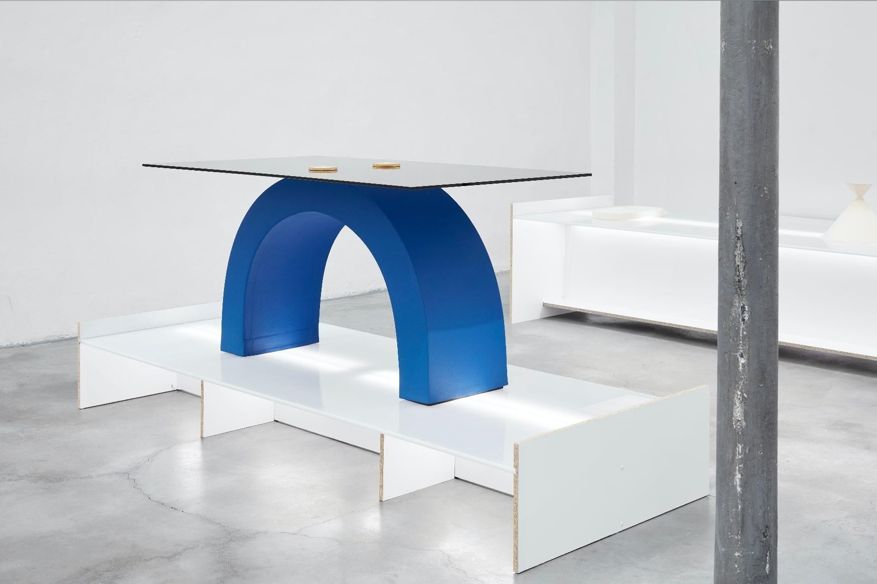 Antithesis table by Onno Adriaanse, 2022
Edition: limited edition of 8.
Dimensions: H 90 x W 160 x D 75 cm
Materials: brass, float glass, steel, foam, polyurethaan coating.
Available in any colour.

Antithesis Table creates visual tension,