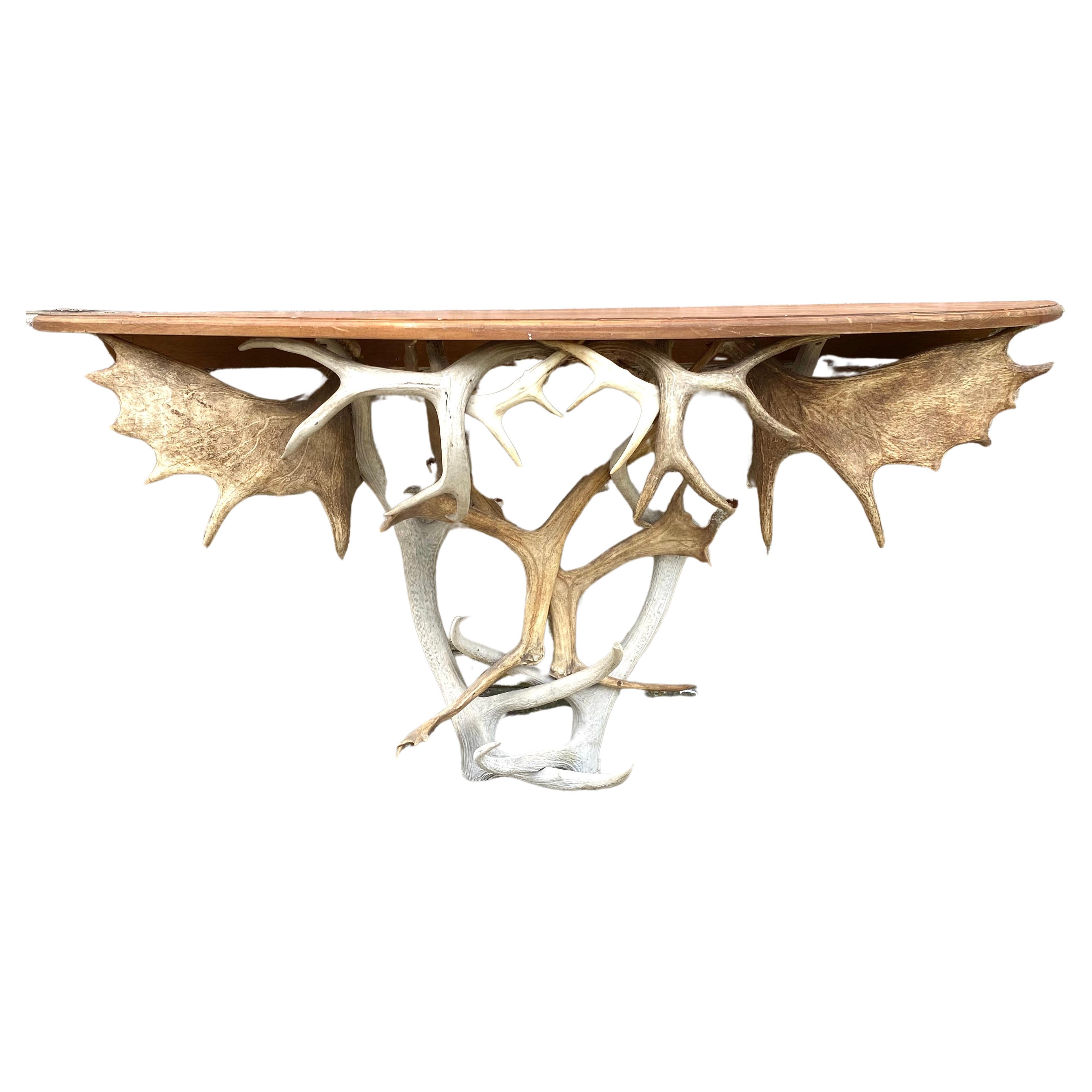 Table console à base de bois de cerf