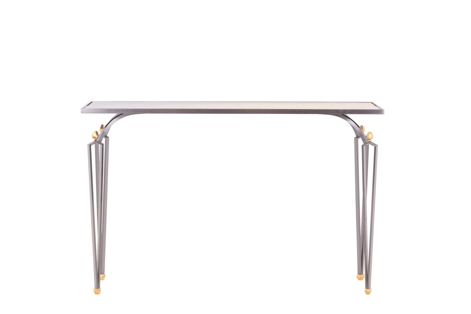 Antoine Dariule, signed. 

Rectangular console. Steel base with golden finishes at the ends and patinated brass top.

Contemporary work of art craftsmanship.