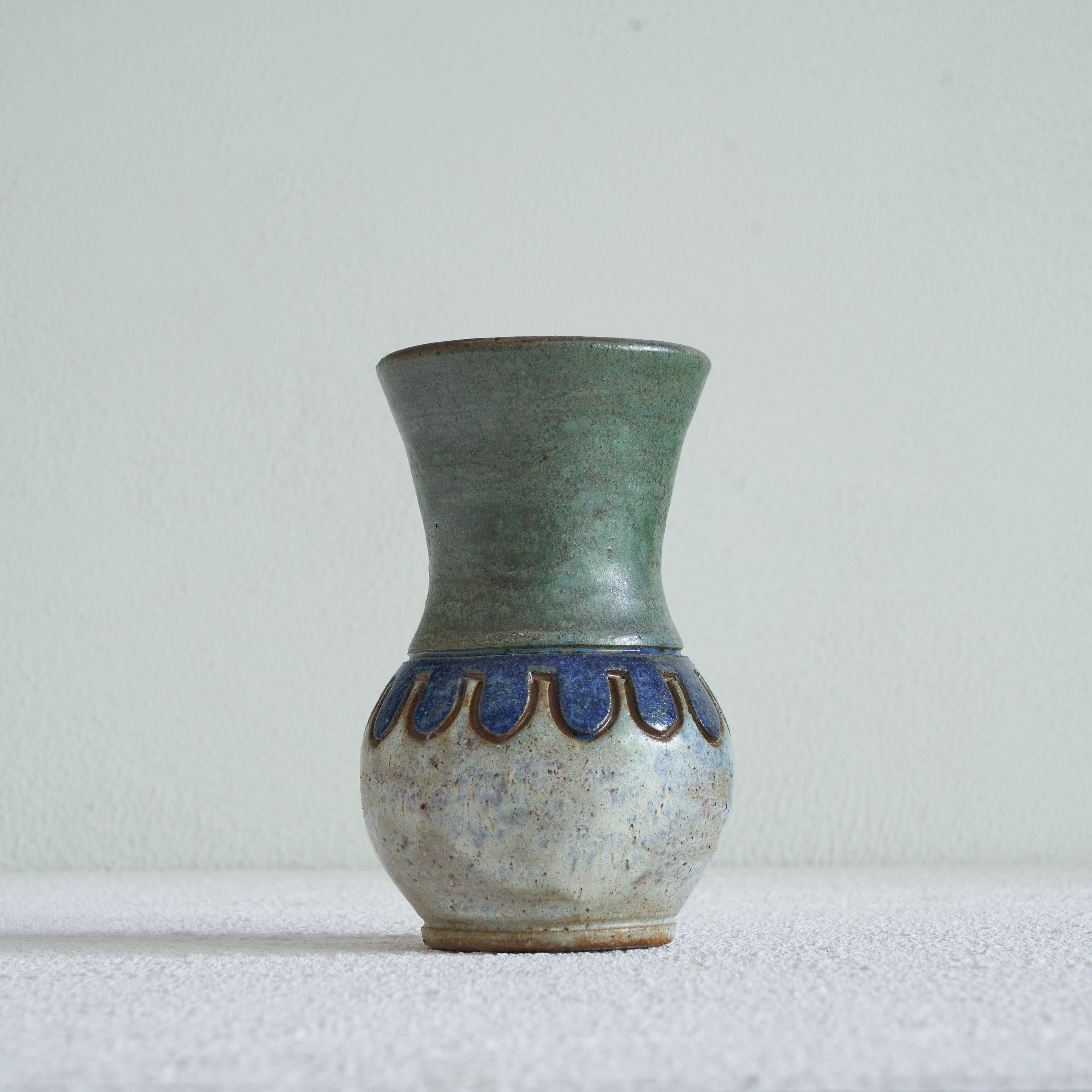 Antoine Dubois Studio Pottery Vase. Mons, Belgium, mid 20th century.

This is an exquisite piece of mid-century Belgian studio pottery, made by Antoine Dubois from Mons. There were several high quality studio pottery workshops around that