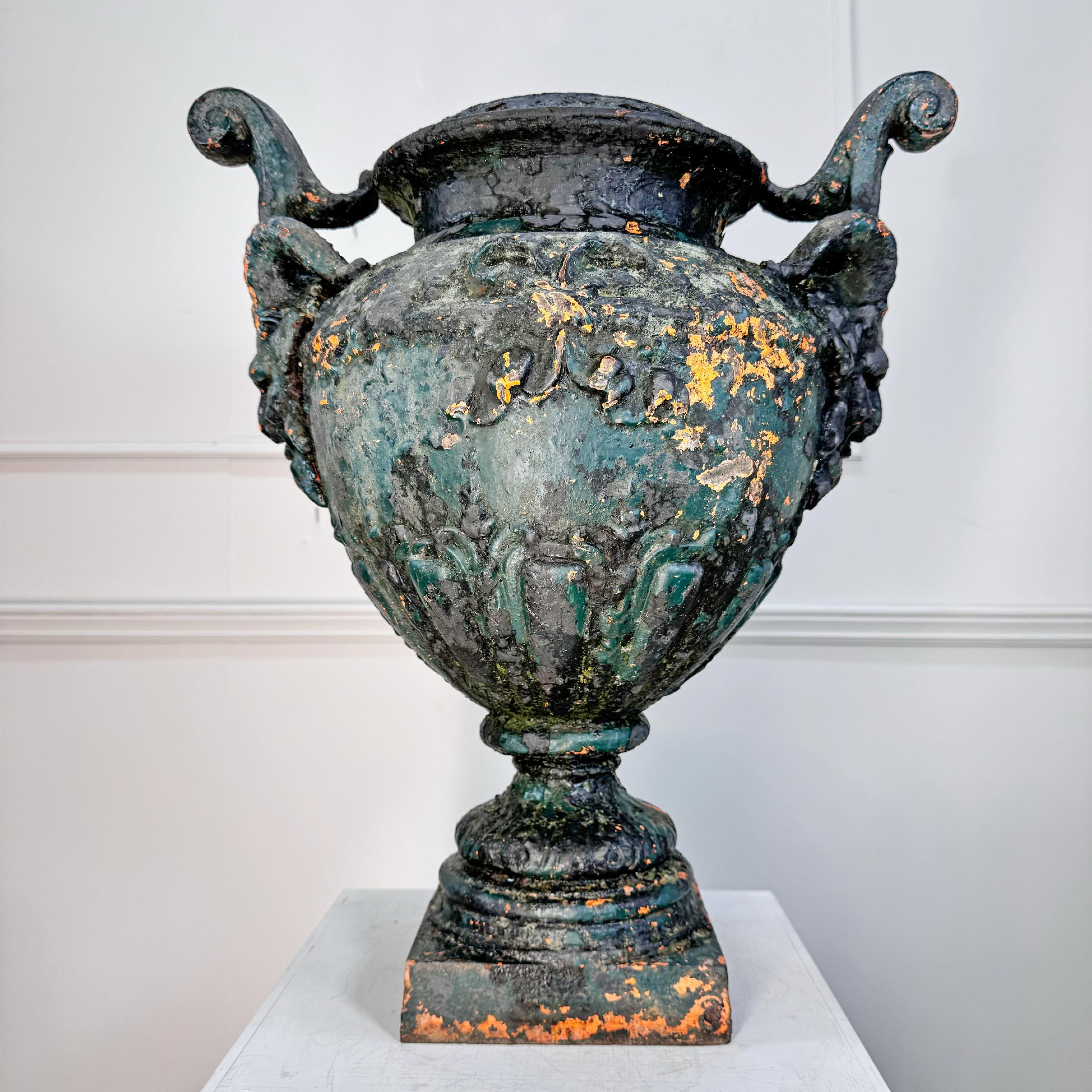 An important and incredibly rare 19th century Satyr Mask Urn from the foundry of Antoine Durenne (catalogue Durenne 1889- PL 404 Coupes et Vases). See last image for catalogue reference.



Adorned with deeply cast and very detailed satyr mask, bows