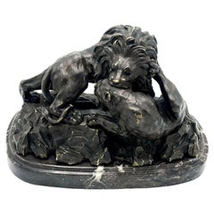 Antique Antoine-Louis Barye (1795 - 1875) bronze, LLion crushing a on oval base, signed